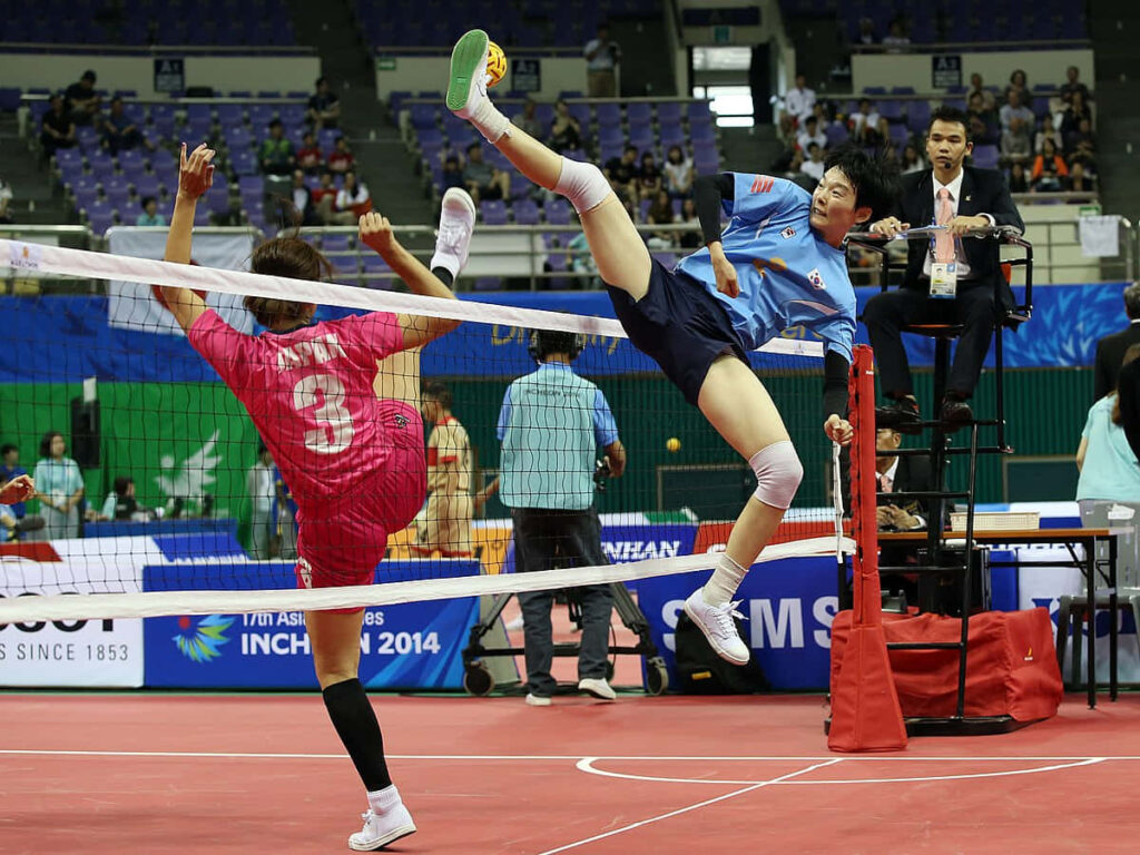 Intense Volleyball Match Wallpaper: Dynamic Players in Action