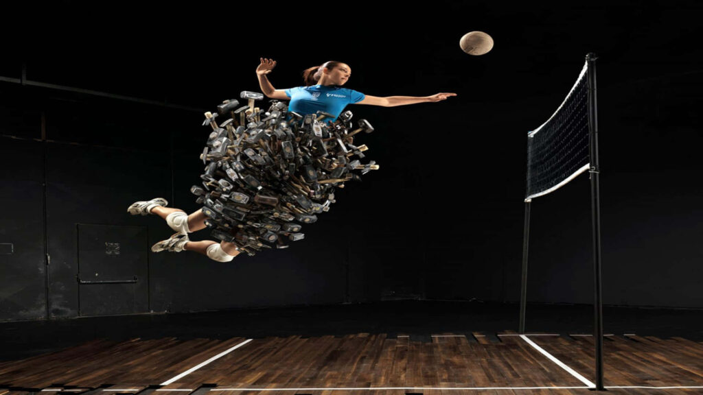 Dynamic Volleyball Wallpaper: Player Mid-Air with Hammers Design