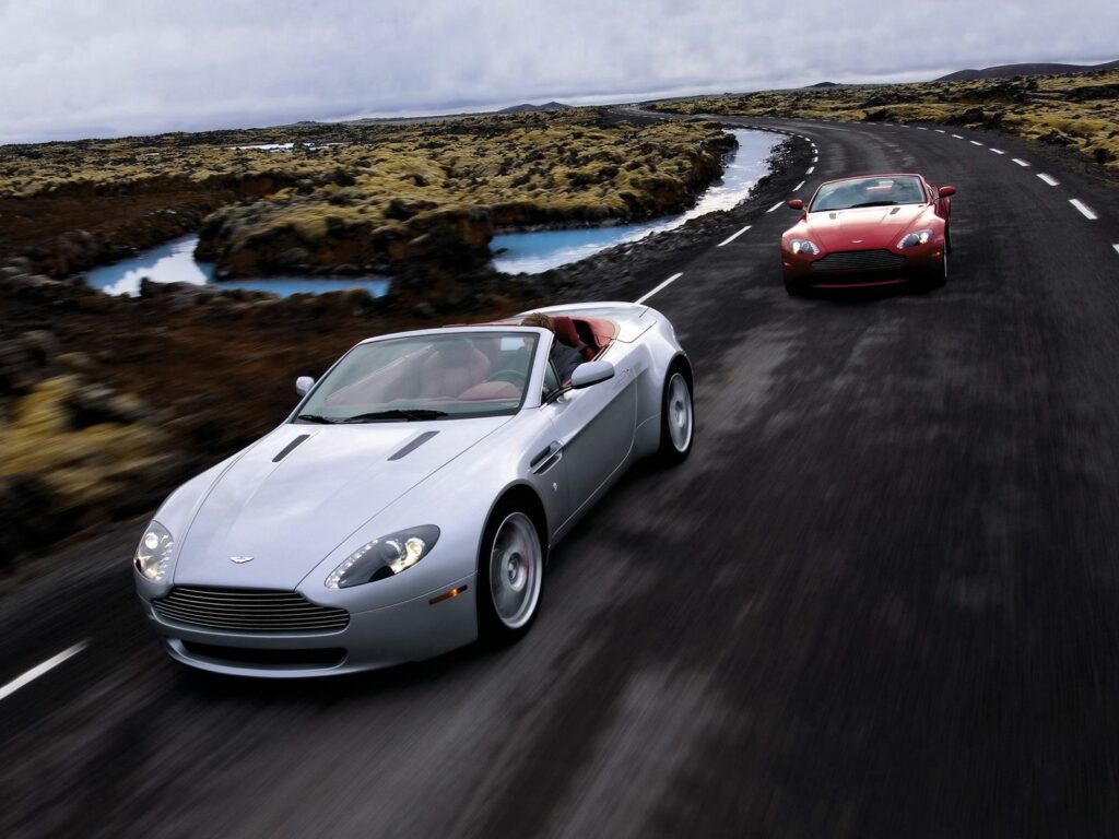 2006 Aston Martin V8 Vantage: Sleek Silver & Red Dynamic Wallpaper