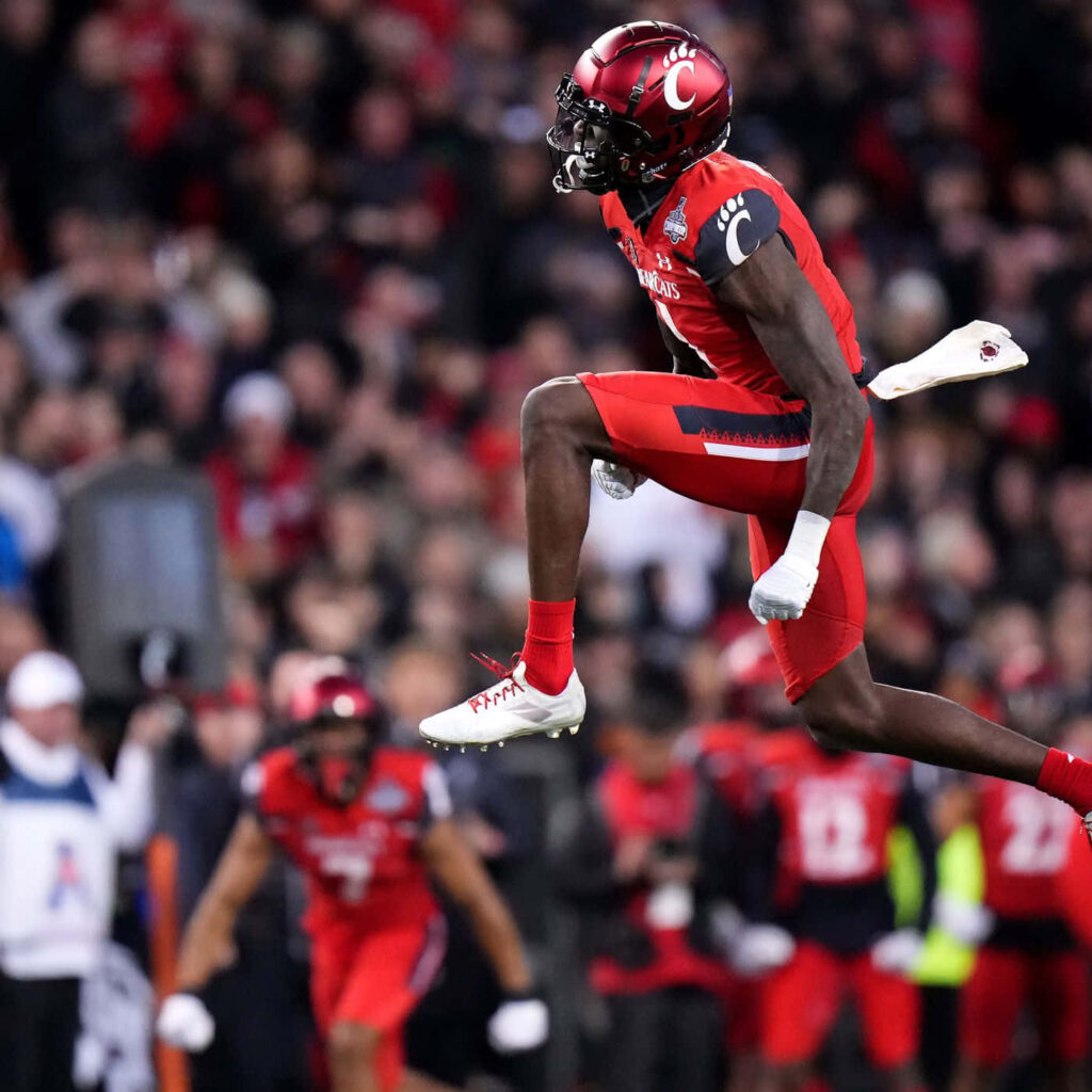 Ahmad Gardner Celebrates: Dynamic Athletic Wallpaper Background