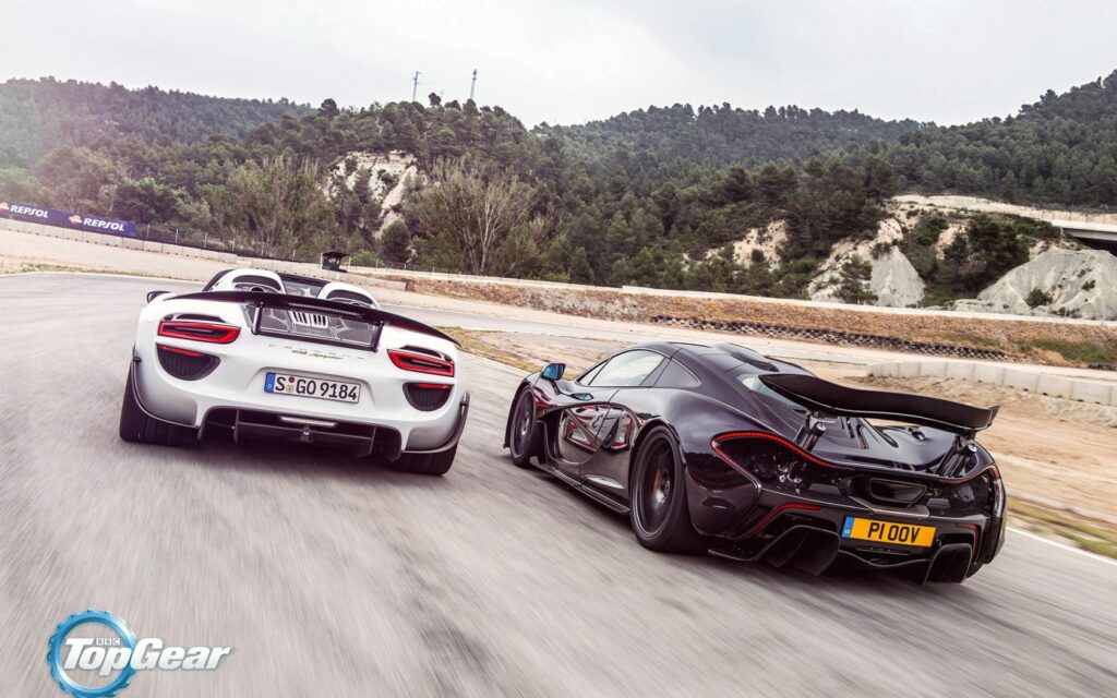 McLaren P1 vs Porsche 918 Spyder: Thrilling Supercar Race Wallpaper