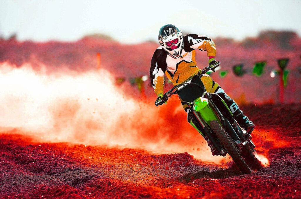 Thrilling Bike Rider Wallpaper: Speed & Fire Action for Motocross Fans