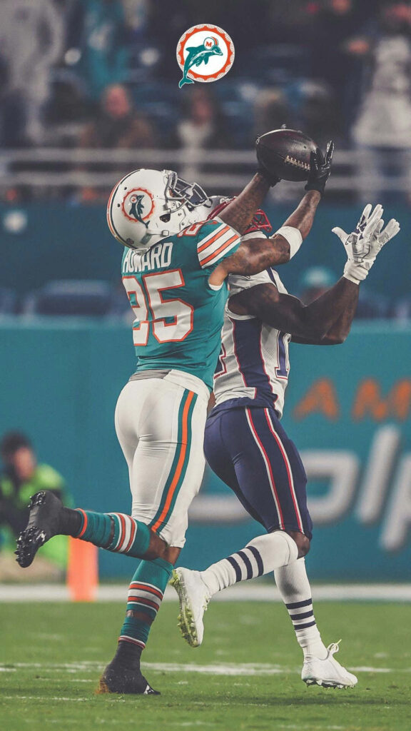 Dynamic Wallpaper: Xavien Howard's Amazing Catch in Football Game
