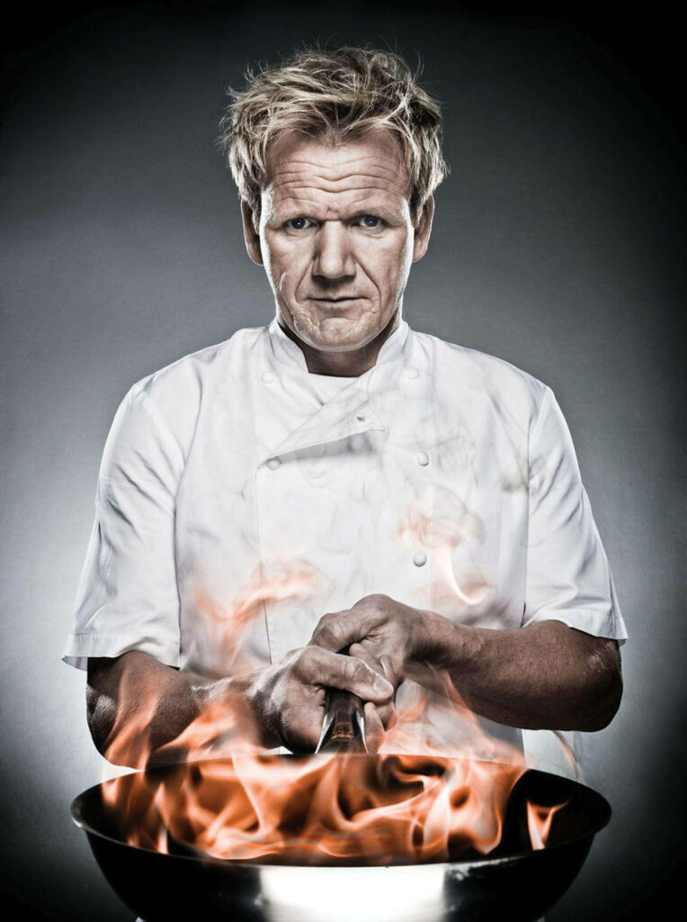 Fiery Gordon Ramsay Wallpaper: Intense Culinary Passion Background