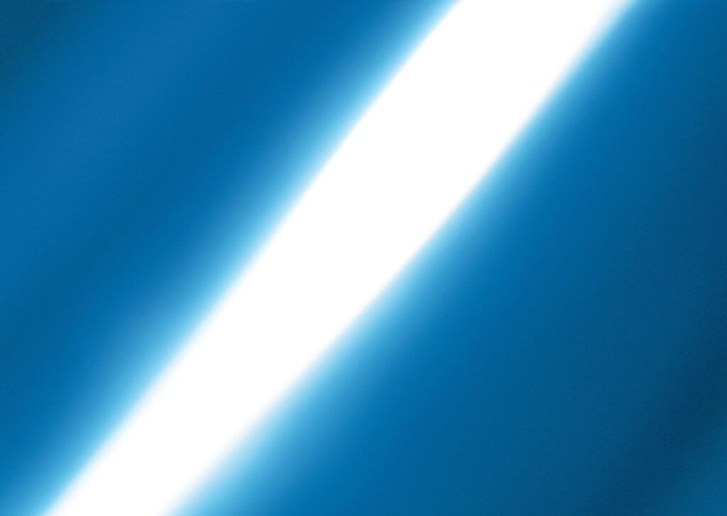 Dynamic White Ray Light Over Deep Blue Gradient - Illuminate Your Space Wallpaper