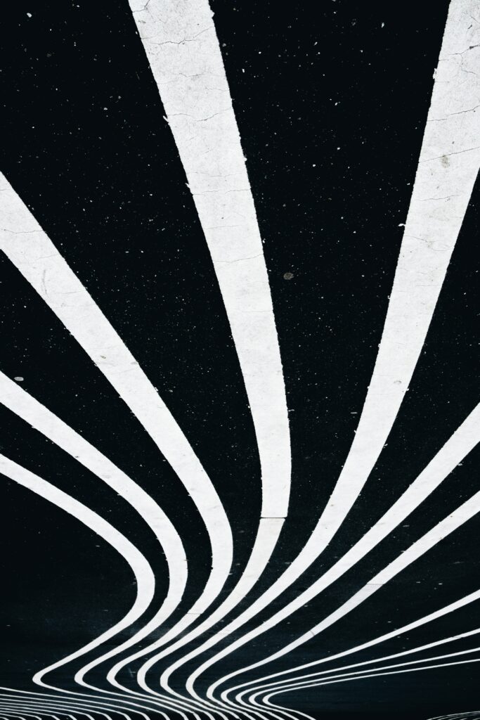 Dynamic White Stripes on Black Background with Textured Paint Spots Wallpaper