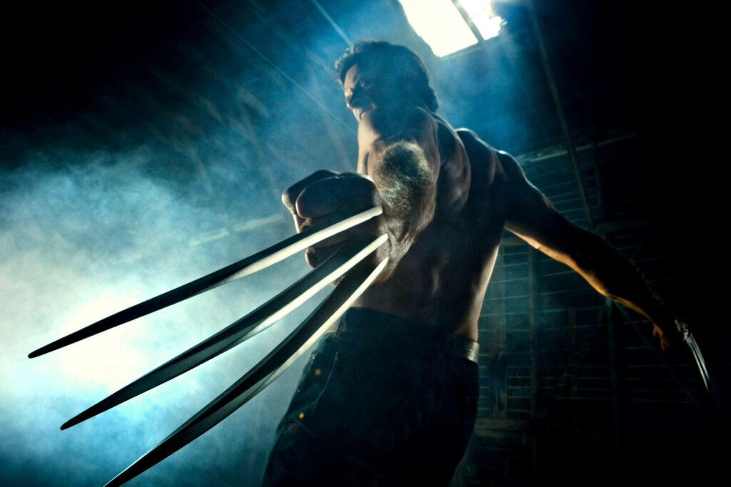 Dynamic Wolverine Low-Angle Wallpaper with Iconic Claws
