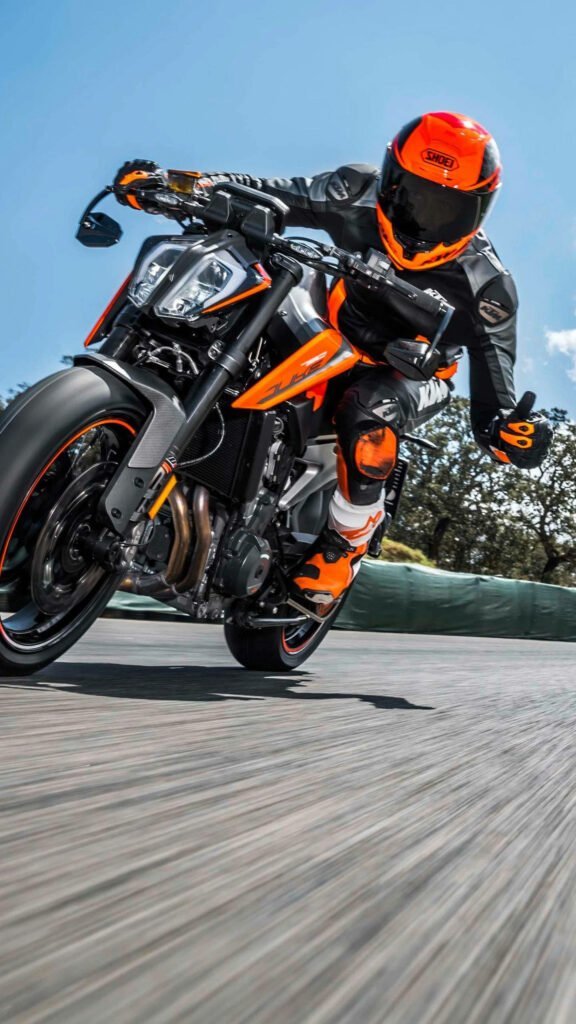 Vibrant KTM Motorcycle Racer iPhone Wallpaper - Motorsport Enthusiast