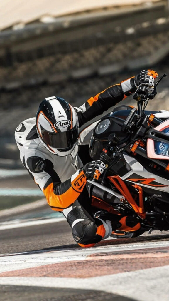 Adrenaline-Fueled iPhone Wallpaper: Racer Leaning into Sharp Turn