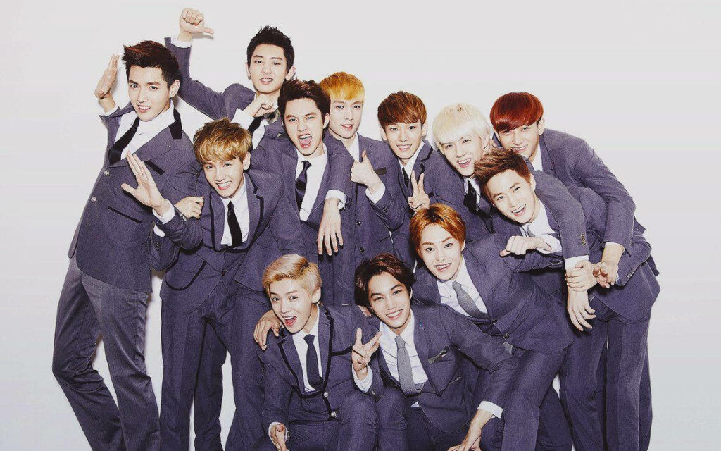 EXO Wallpaper: All Members in Stylish Suits - Charming Studio Backdrop