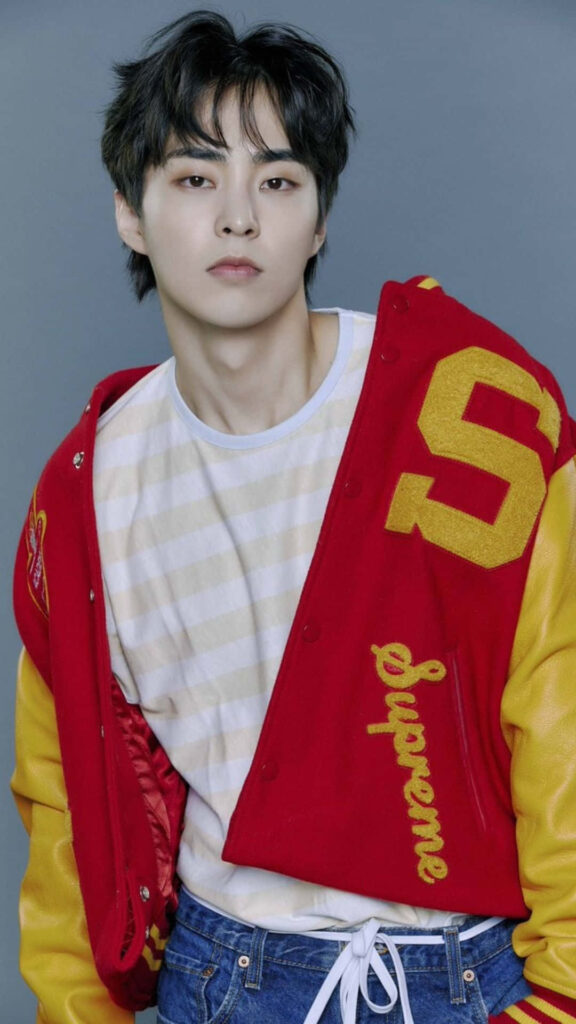 EXO Member in Varsity Jacket: Stylish Portrait Wallpaper