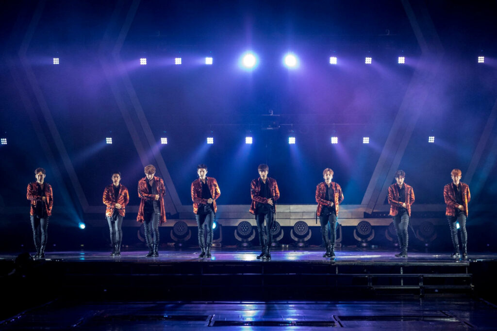 EXO OT8 Performance Wallpaper: Dynamic K-POP Stage Background