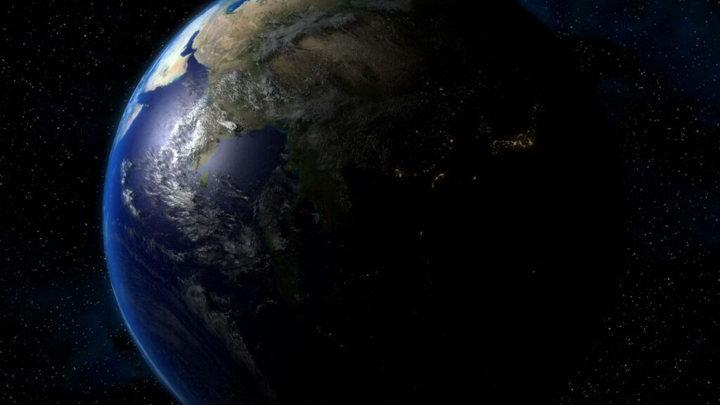 Awe-Inspiring Capture: The Spectacular 4k Earth in a Mesmerizing Day and Night Cosmic Display - Immersive 4k Earth Backdrop Wallpaper