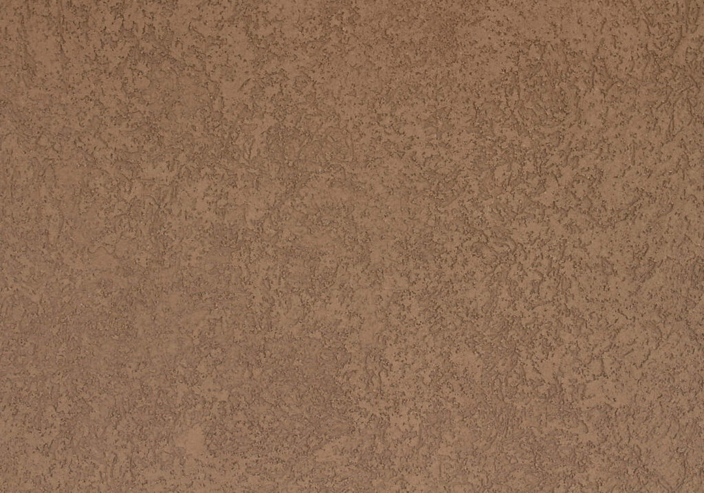 Earthy Brown Stucco Wallpaper: Sophisticated Interior Background