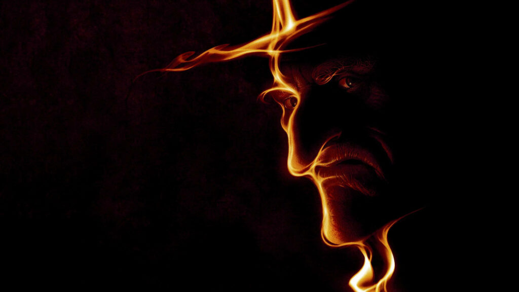 Ebenezer Scrooge dramatic fiery face illuminated Christmas Carol dark striking wallpaper background