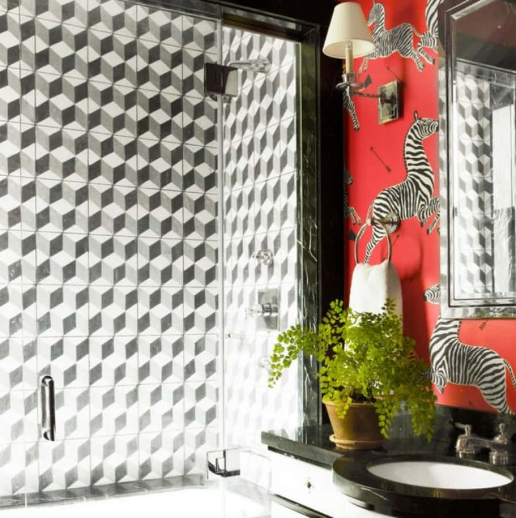 Eclectic bathroom with 3D geometric tile shower and zebra print red wallpaper vanity area