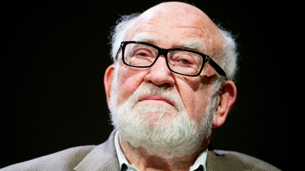 Close-up portrait of legendary actor Ed Asner with thoughtful expression and natural lighting wallpaper