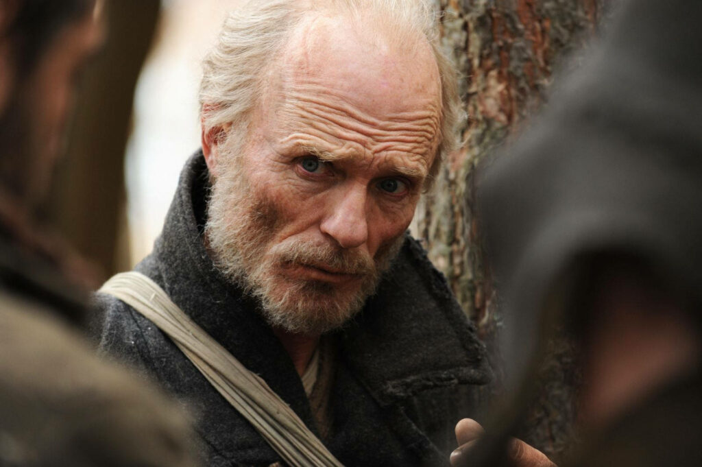 Ed Harris in The Way Back rugged outdoor scene intense expression survival theme wallpaper