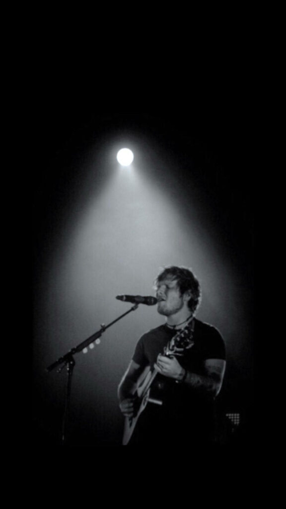 Ed Sheeran Monochrome Wallpaper: Passionate Stage Performance