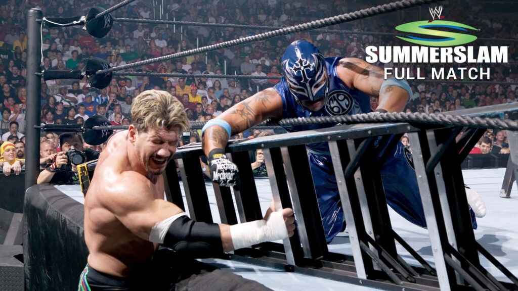 Eddie Guerrero vs Rey Mysterio intense SummerSlam ladder match vibrant WWE crowd wallpaper