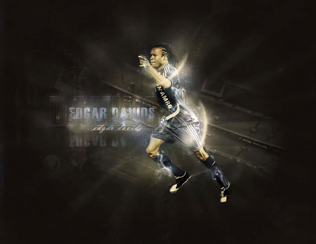 Edgar Davids in dynamic motion with glowing effects vibrant lighting football wallpaper background