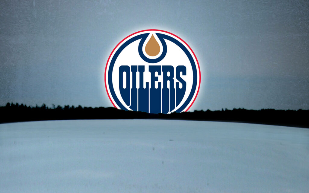 Edmonton Oilers logo on snowy field with dark trees winter landscape wallpaper background
