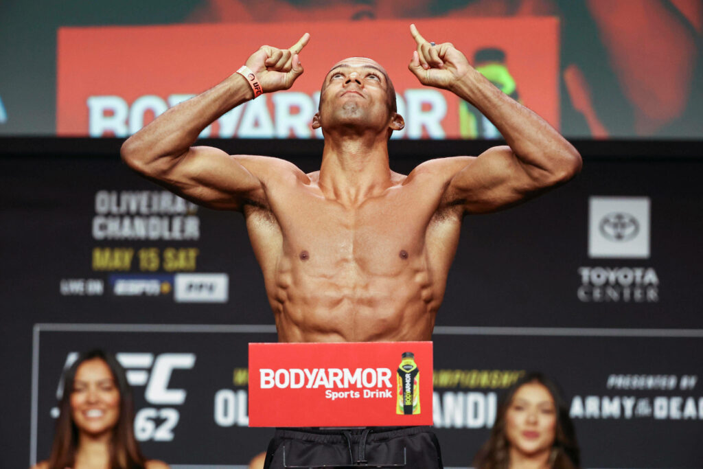 Shirtless Edson Barboza UFC weigh-in confident pose muscular physique intense sports wallpaper background