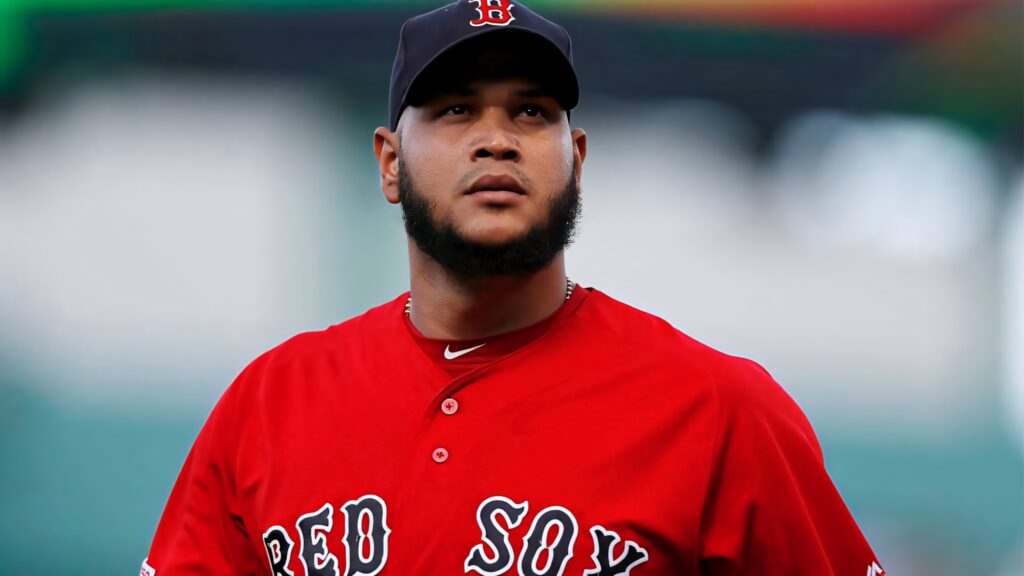 Eduardo Rodríguez Boston Red Sox pitcher in vibrant uniform with stadium background wallpaper