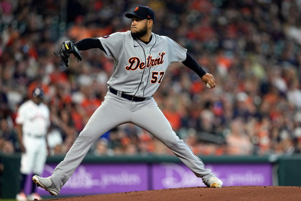 Eduardo Rodríguez pitching in Detroit Tigers uniform with dynamic motion and focused intensity Wallpaper