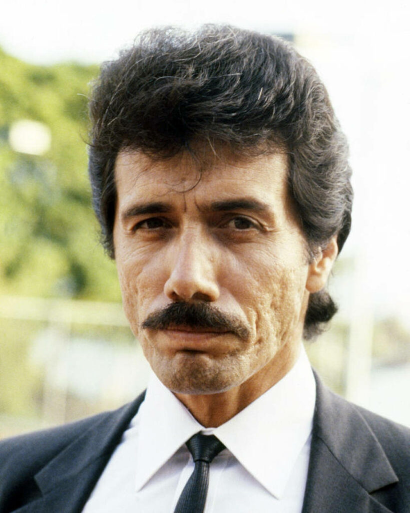 Edward James Olmos classic portrait with strong expression and signature mustache wallpaper background