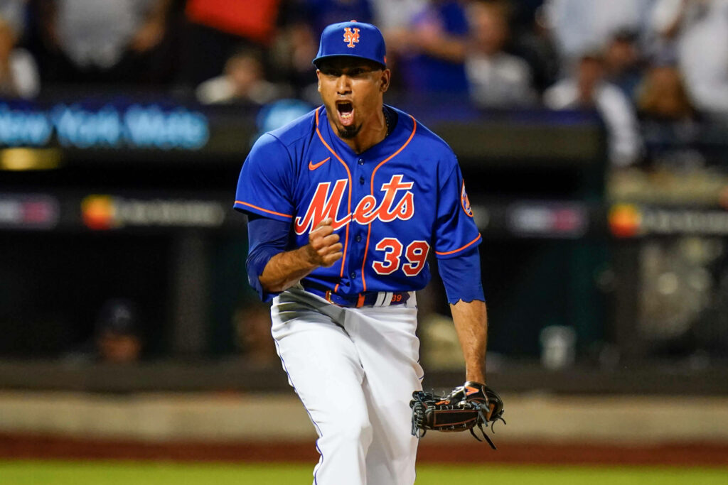 Edwin Diaz New York Mets closer in blue and orange uniform pitching with intense focus wallpaper