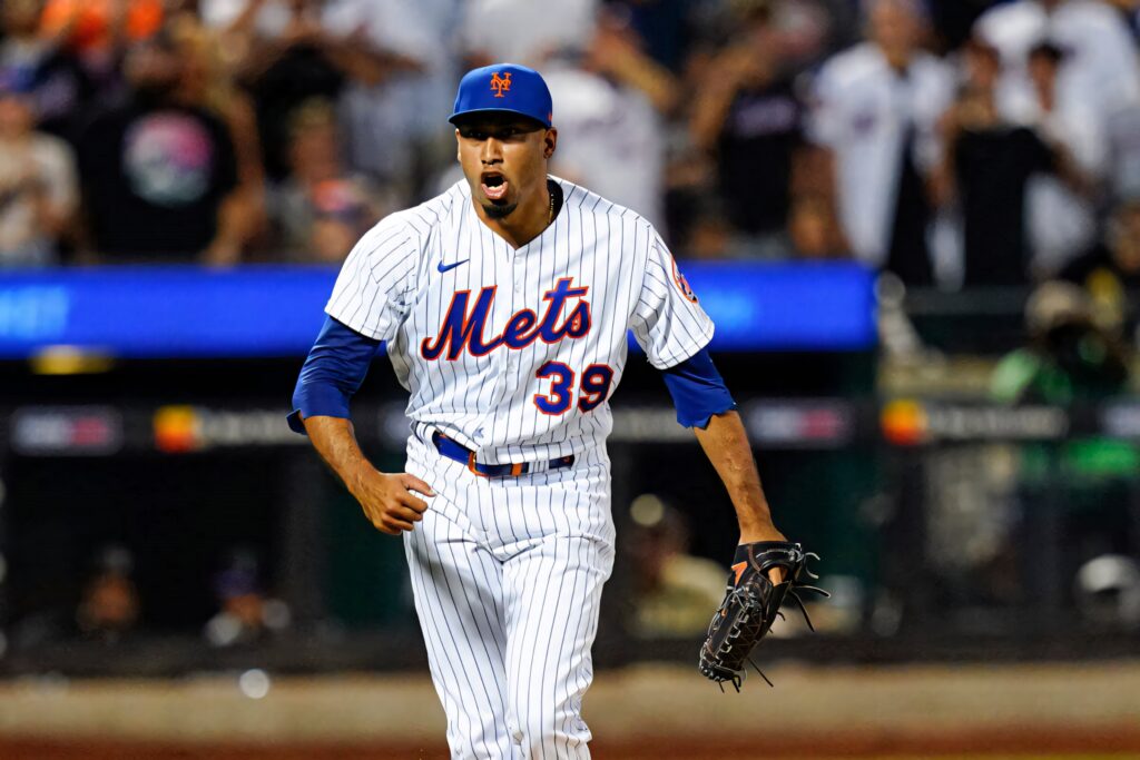 Edwin Diaz New York Mets wallpaper closeup celebrating on mound vibrant baseball action background