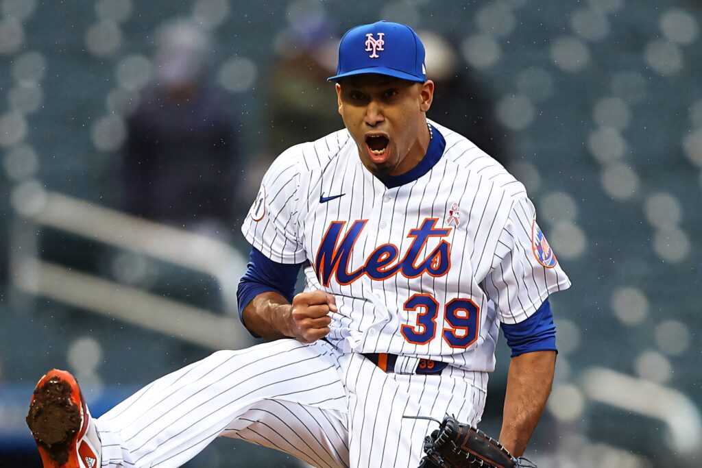 Edwin Diaz pitching in New York Mets uniform blue orange detailed pinstripes action wallpaper