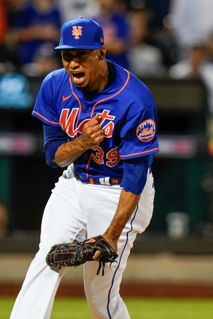 Edwin Diaz New York Mets pitcher intense moment on mound blue orange uniform sports wallpaper