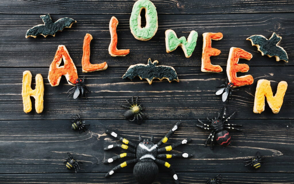 Spooky Halloween Vibes: October Pumpkin with Spider Decorations - QHD Halloween Holiday Wallpaper