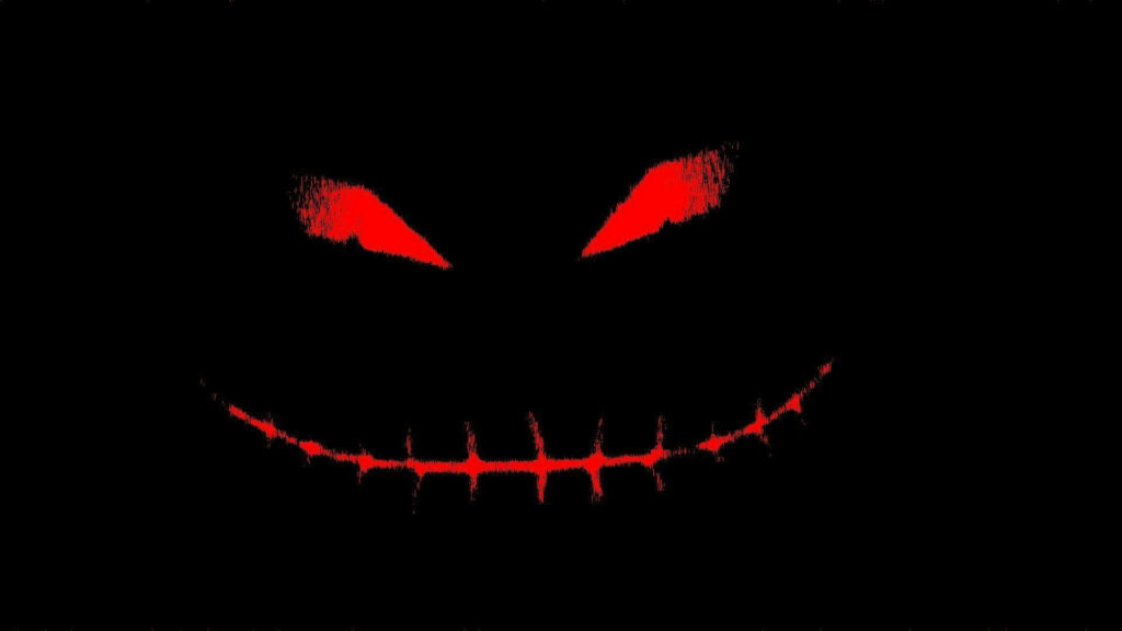 The Sinister Grin: A Chilling Red and Black Phone Skin Unveiling an Eerie Smiley on a Jet-Black Canvas Wallpaper