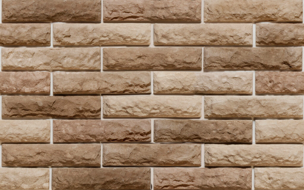 The Claystone Blend: Natural-Looking Wall Tiles Wallpaper with a Photo of Handcrafted Cladding in the Background