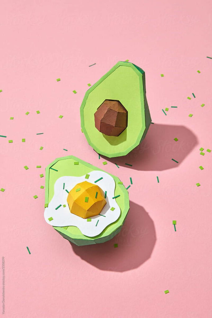 Egg-celent Avocado Duo: A Delightful, Wholesome Wallpaper Featuring a Handmade Slice of Avocado with an Irresistible Egg Garnish!