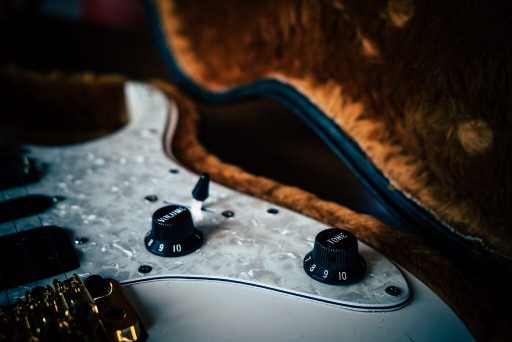 Elegant Electric Guitar Close-Up Wallpaper: Detail & Craftsmanship