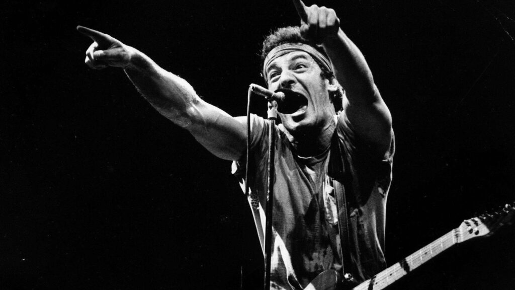Bruce Springsteen electrifying live performance Philadelphia Spectrum black and white rock wallpaper