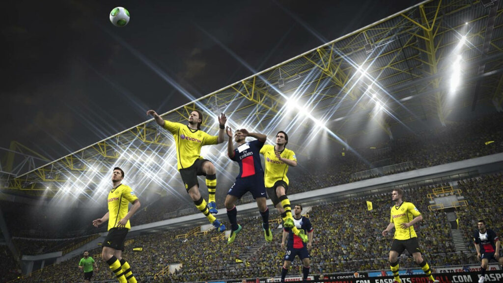 FIFA Action: Borussia Dortmund vs PSG Under Bright Stadium Lights Wallpaper