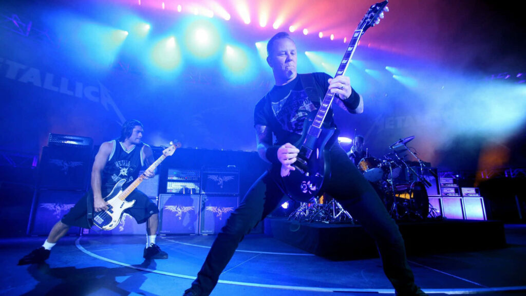 High-Energy Metallica Concert Wallpaper: Electrifying Stage Lights