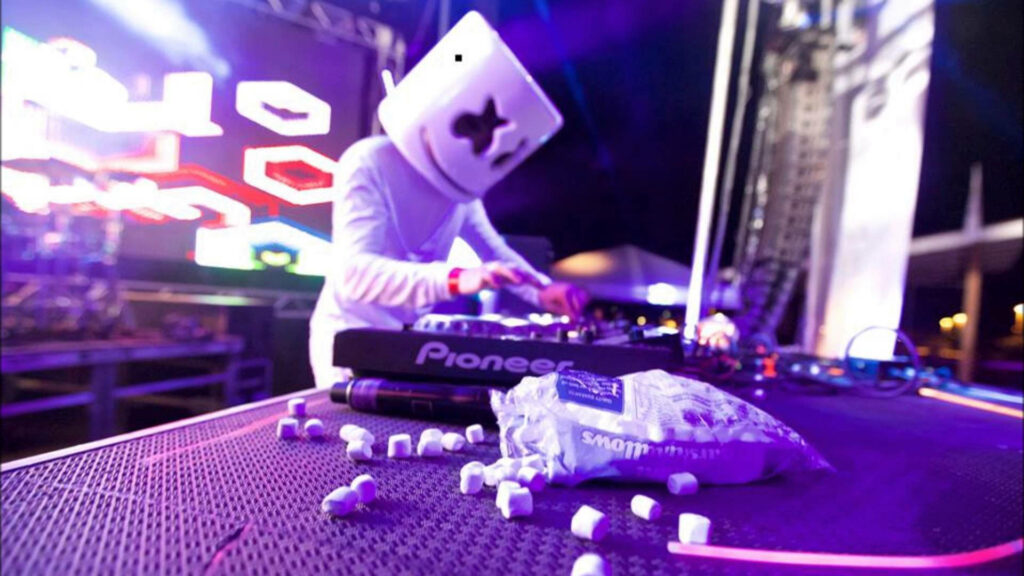 Electrifying Beats: Marshmello Dj Rocks the Stage with Turntable Mastery Wallpaper