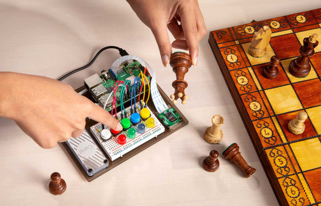 Electronic chessboard with wooden pieces and colorful buttons blending classic and modern tech Wallpaper