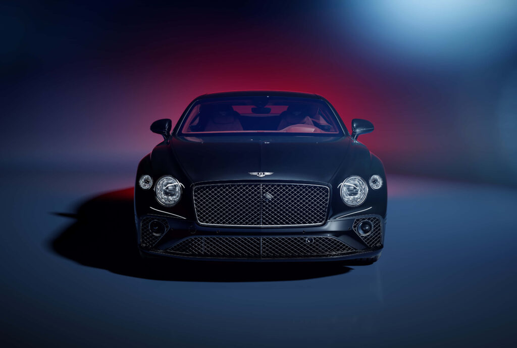 Supreme Luxury of the Bentley Continental GT on an Open Road Wallpaper