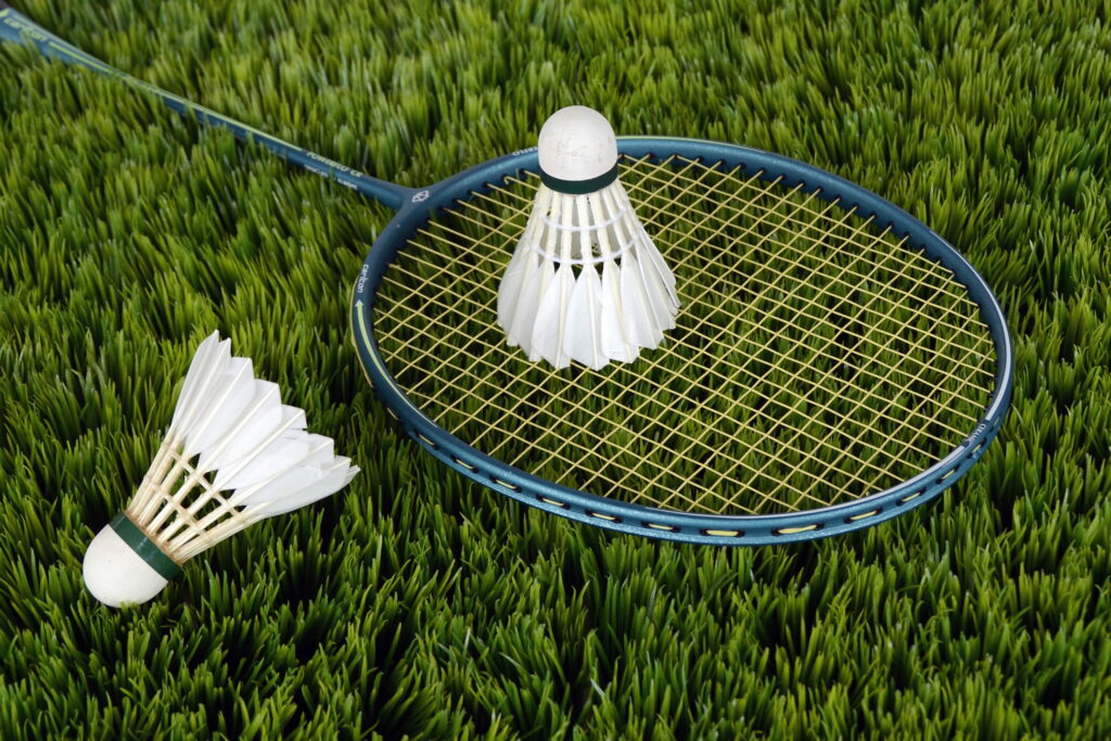 Vibrant Blue Badminton Gear Dominating the Court - Striking 4K Wallpaper