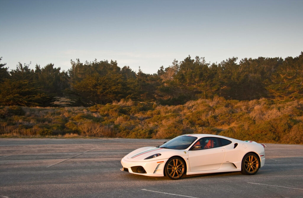 Exquisite Elegance: A Mesmerizing Portrait of a Stunning White Ferrari F430 Scuderia Wallpaper