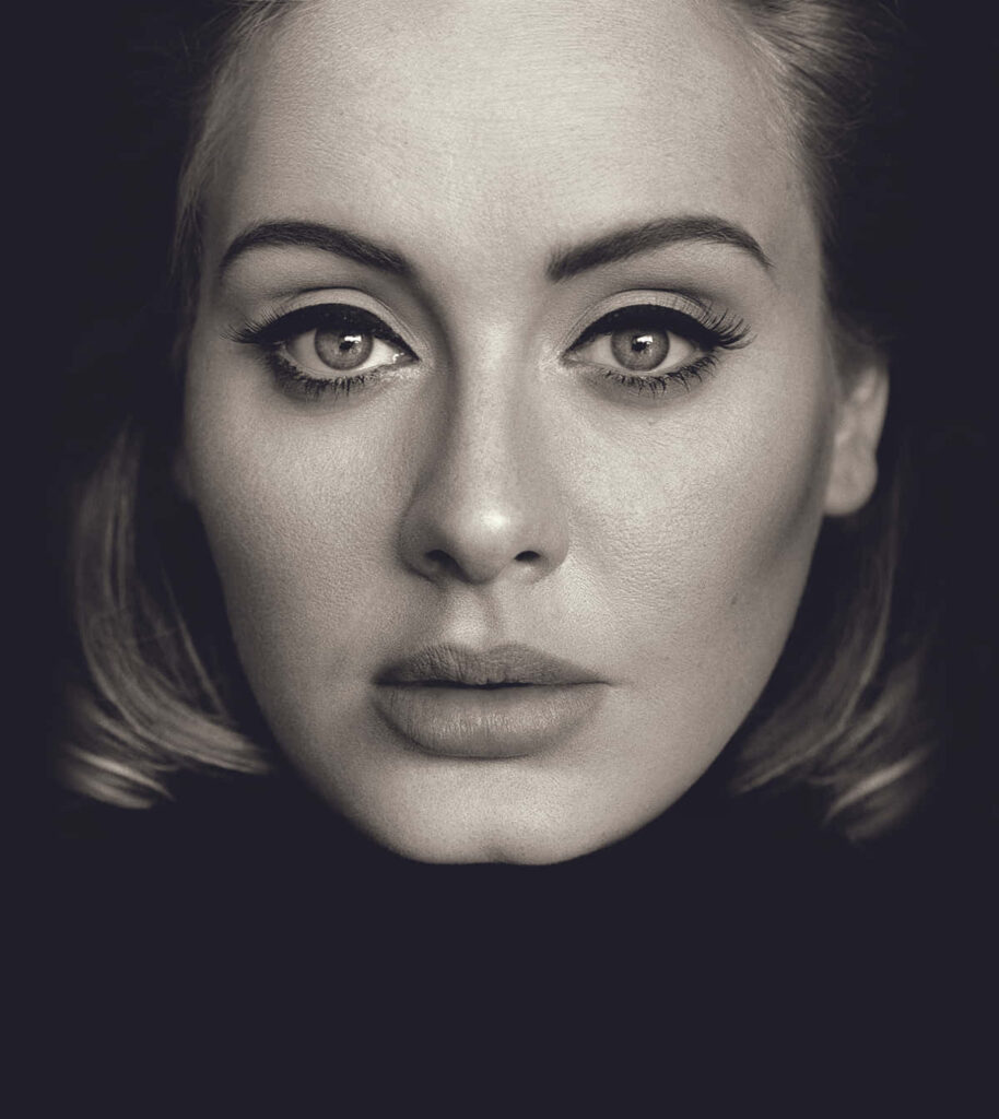 Elegant Adele Wallpaper: Striking Features & Expressive Eyes Background