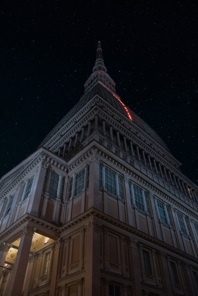 Elegant Architectural Masterpiece Wallpaper Under Starry Night Sky