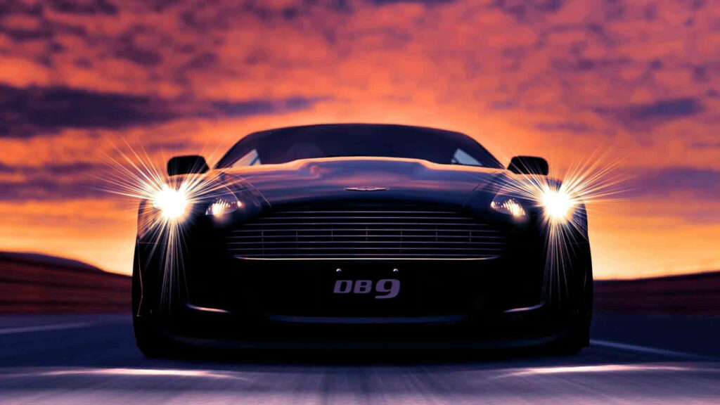 Luxury Aston Martin DB9 Wallpaper: Sunset Elegance & Performance